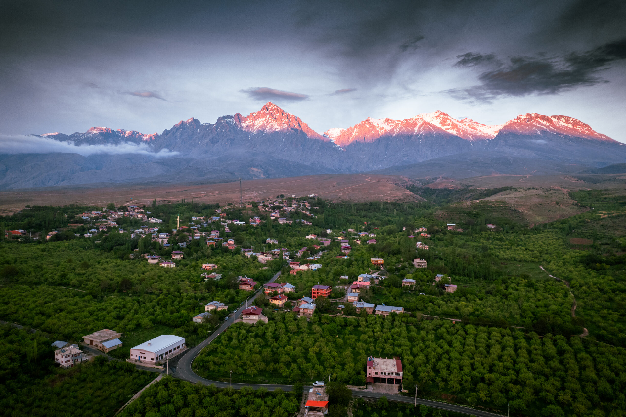 Aladaglar General view during spring, green grass and snowy peaks, mountain range in central anatolia