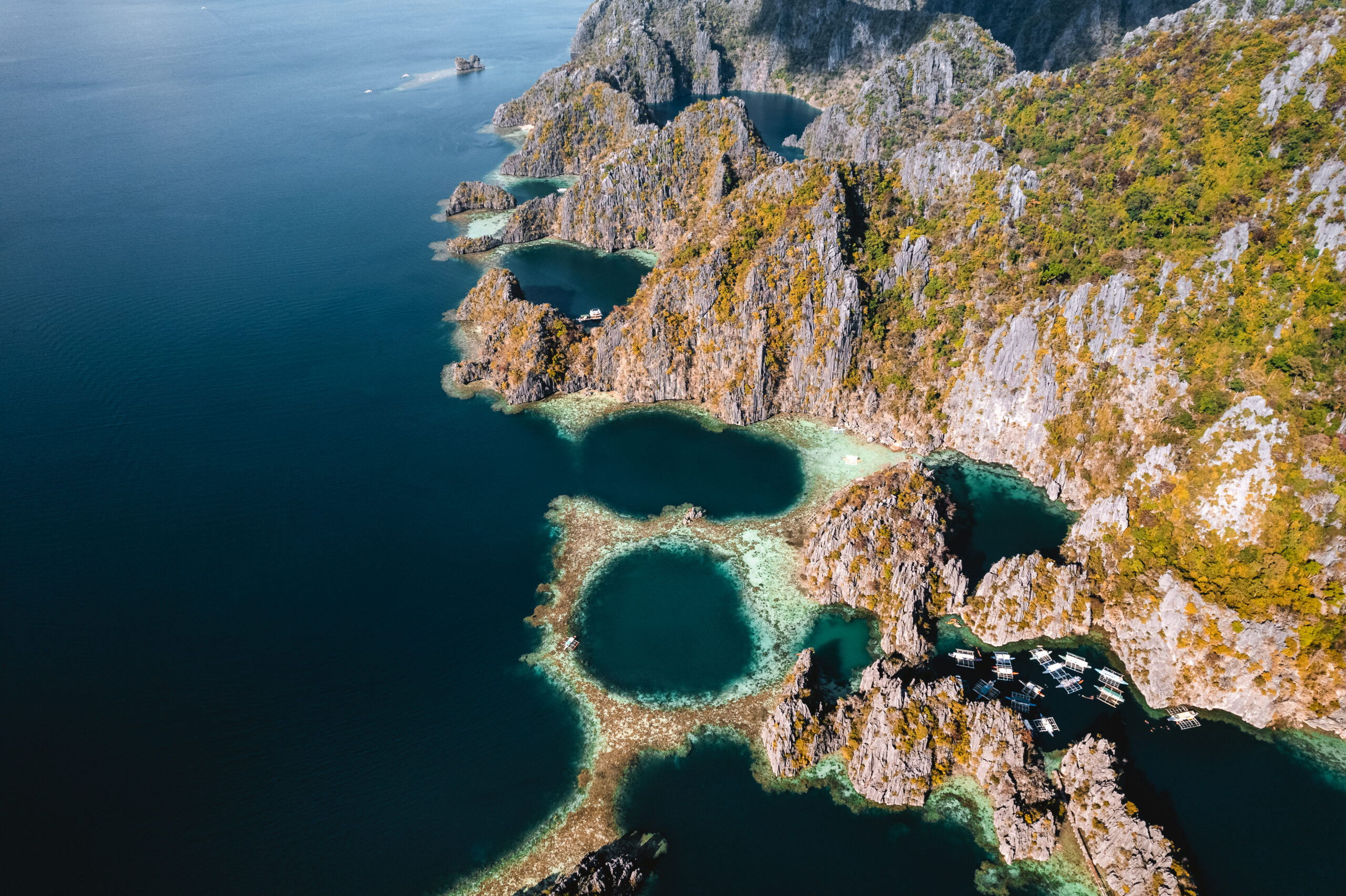 Aerial view of Twin Lagoon turquoise waters with a drone The Philippines Coron . High quality photo