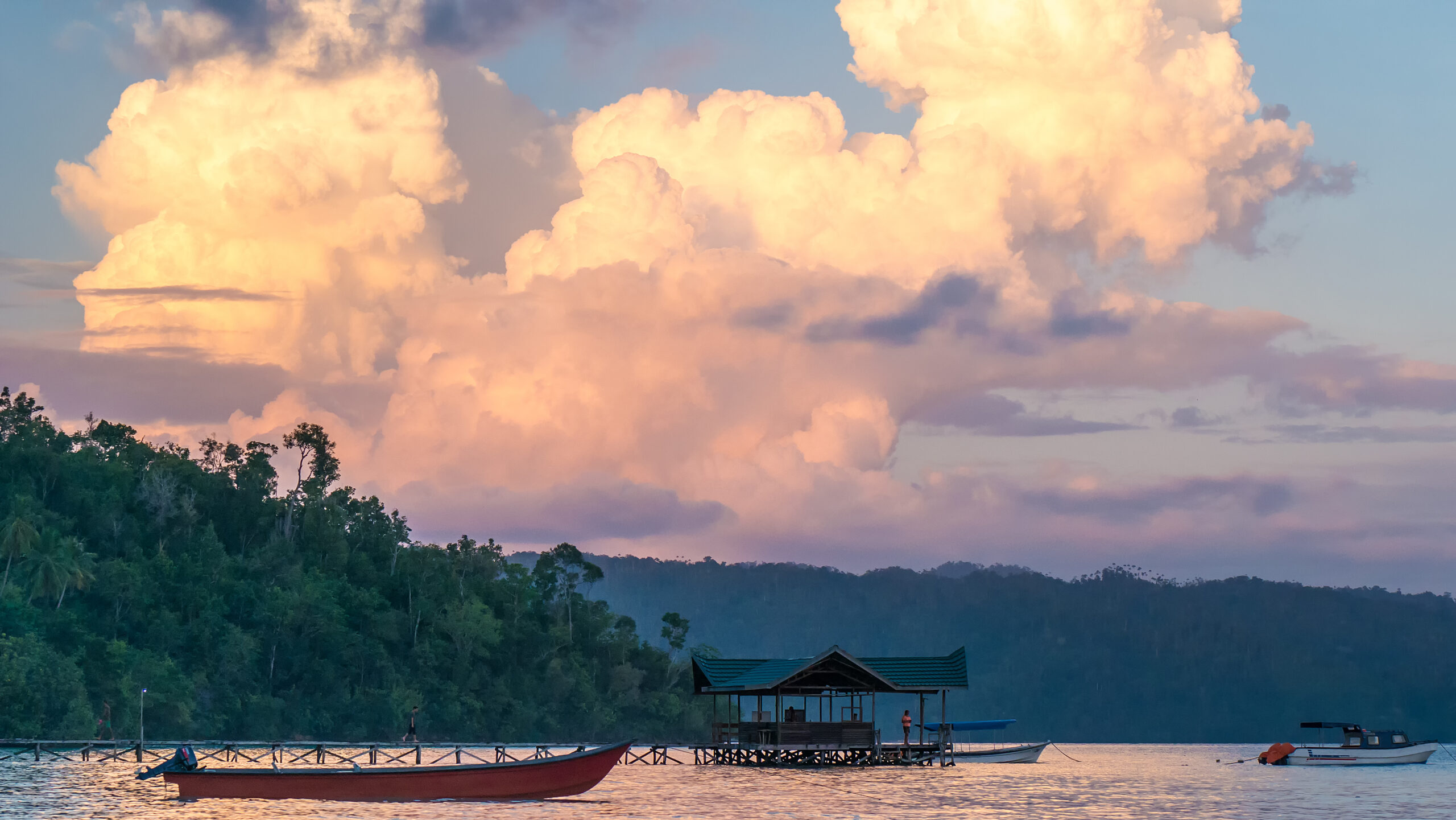 Huge White Clouds above Diving Station on Sunset, Homestay Gam Island, West Papuan, Raja Ampat. Indonesia