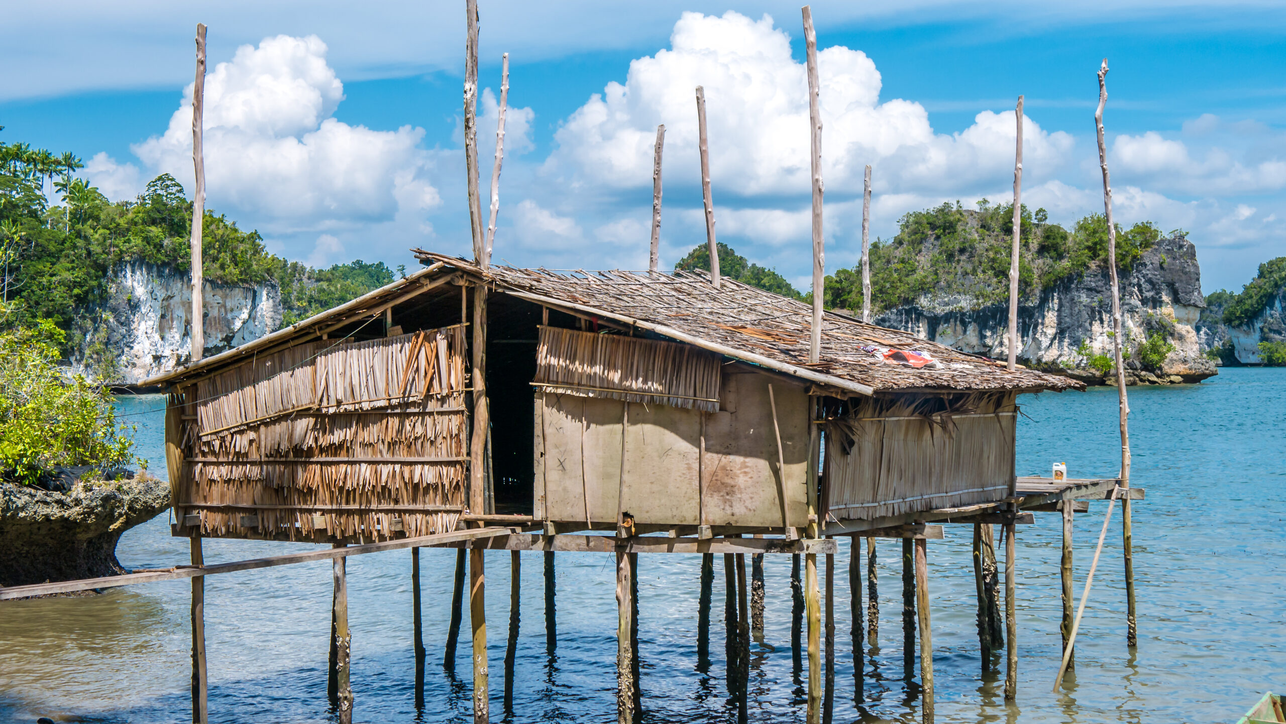Local Bamboo Hut in Kabui Bay near Waigeo. West Papuan, Raja Ampat, Indonesia.